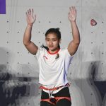 Atlet panjat tebing Indonesia Desak Made Rita Kusuma Dewi melakukan selebrasi usai menang melawan atlet China Lijuan Deng saat final speed putri Asian Games 2022 di Shaoxing Keqiao Yangshan Sport Climbing Centre, Shaoxing, China, Selasa (3/10/2023).